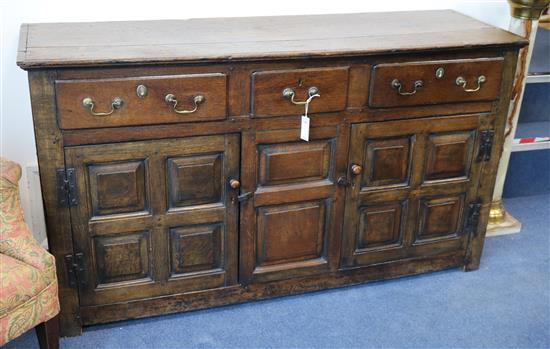 A George III oak dresser W.156cm